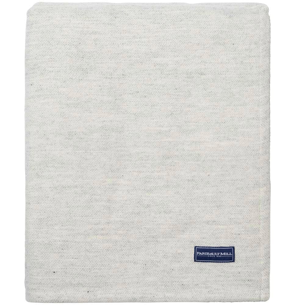 Faribault Mill Lakefront natural lightweight wool bed blanket, folded and displayed in a top-down view.