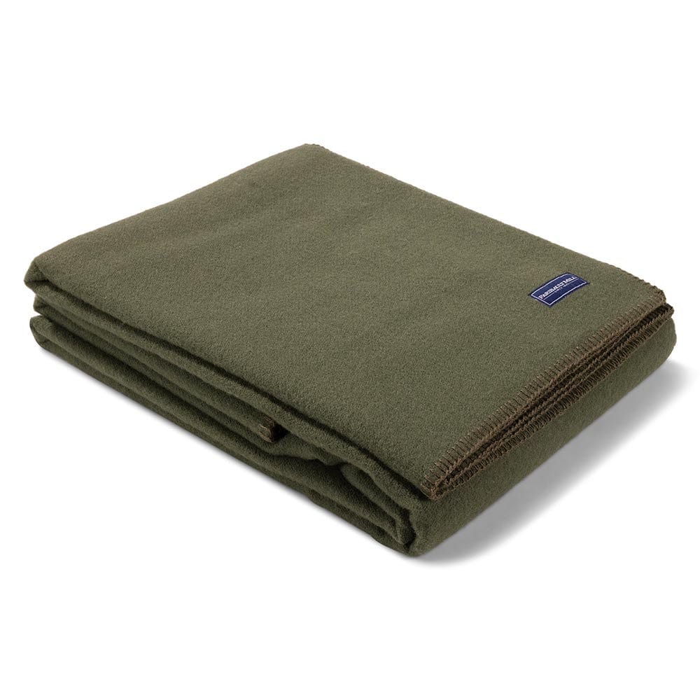 Faribault Mill Pure and Simple olive middleweight wool bed blanket, folded and displayed at an angle to highlight the thickness, loft of the wool, and whipstitched edges.