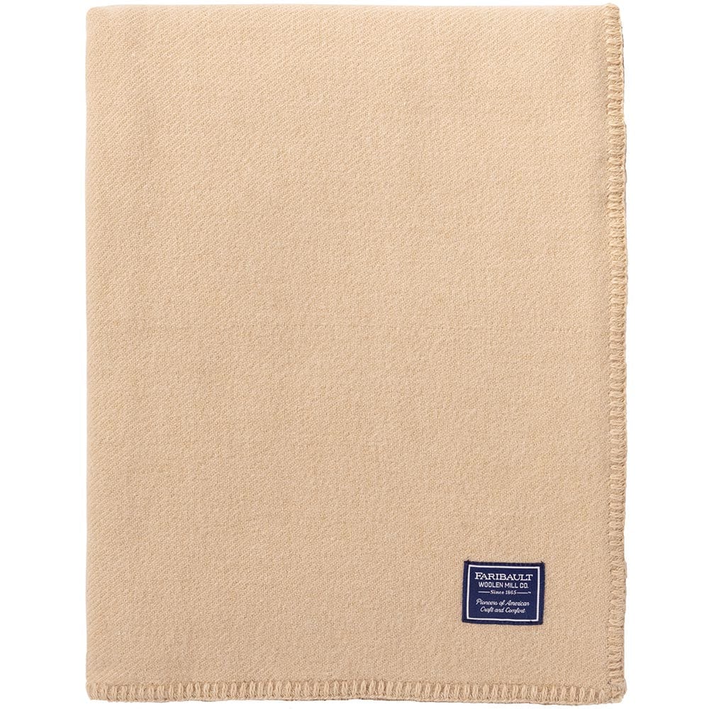 Faribault Mill Pure and Simple camel middleweight wool bed blanket, folded and displayed in a top-down view.