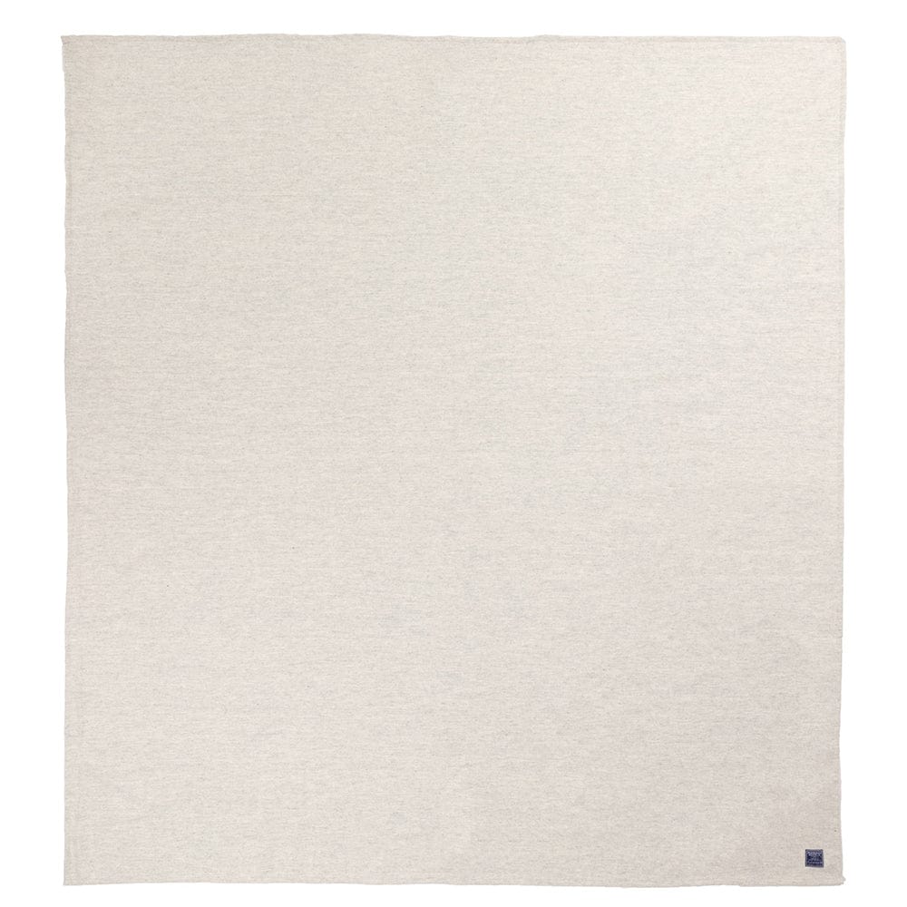 Faribault Mill Lakefront natural lightweight wool bed blanket, unfolded and laid flat in a top-down view.