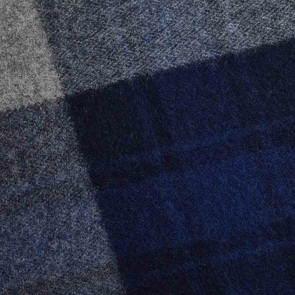 Faribault Mill North Shore blue middleweight wool bed blanket, displayed close-up showing the weave and texture detail.