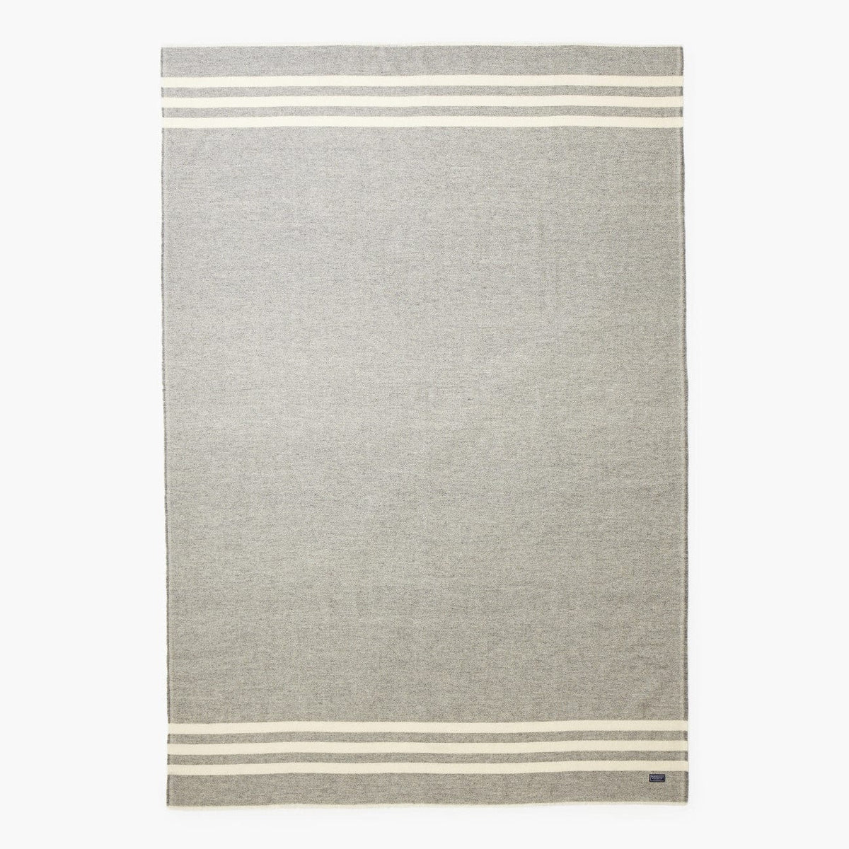 Faribault Mill Trapper gray lightweight wool throw, unfolded and laid flat in a top-down view.
